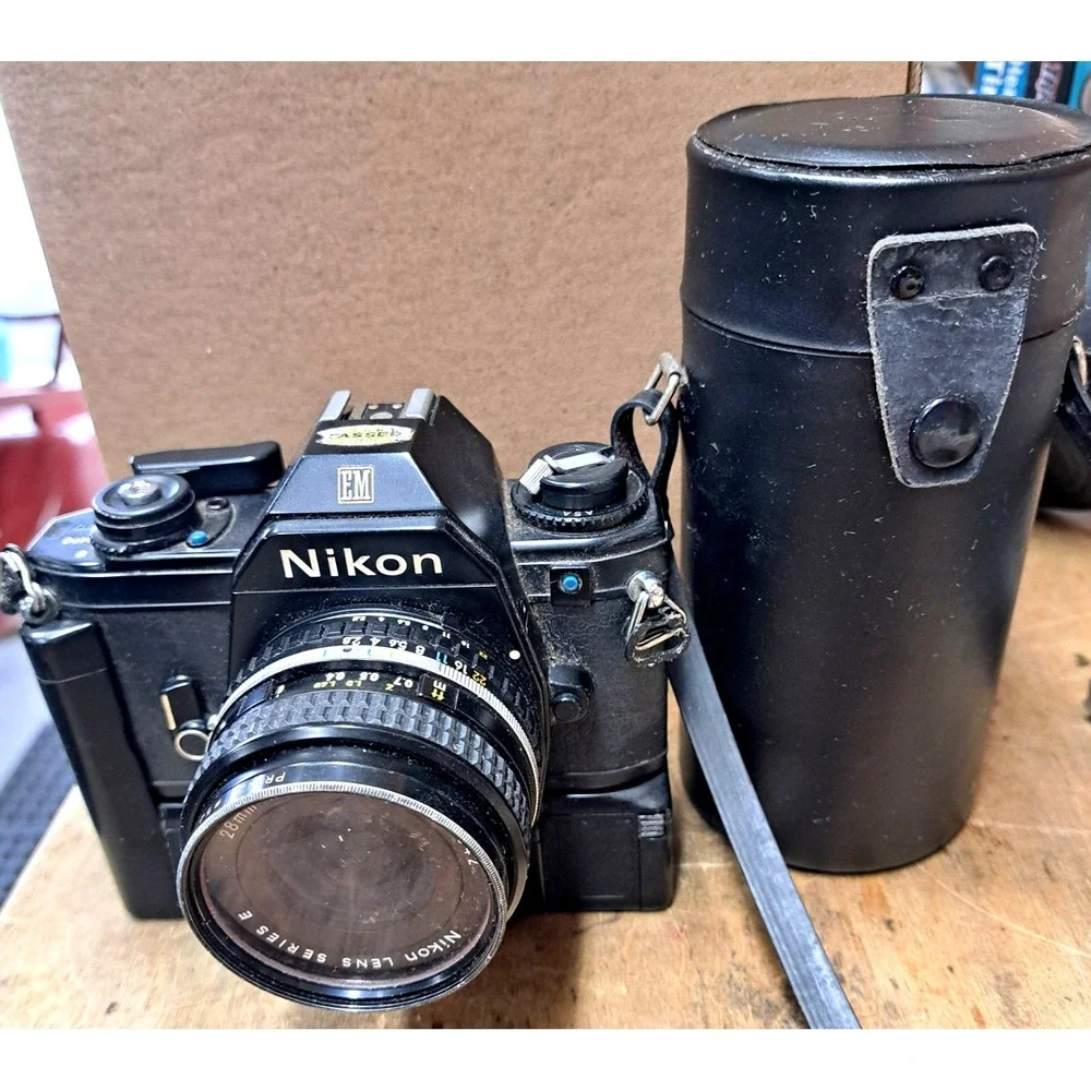 Vintage Nikon EM Black SLR Film Camera + Nikon Lens + Flash + Film + Manuals